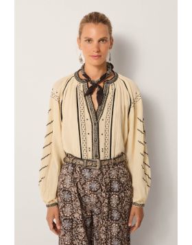 An effortlessly charming shirt by Maison Hotel is a perfect go to for the season. The Ringo Shirt in Crinkle Cotton features an overall striking embroidery and front open neck with front button and full sleeves. Style with easy wide leg pants for an easy 
