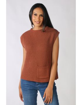 This chunky rib knitted vest from Marco Polo is a must have in your winter wardrobe! With a round neckline and drop shoulders it is the perfect layering piece. It is sleeveless and features a small front pocket and it made from a soft cotton blend. Style 