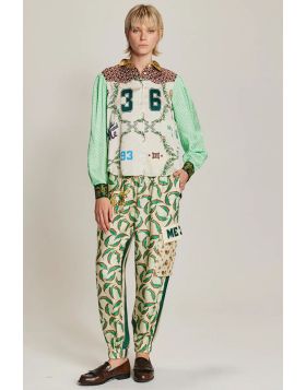 Gianna cargo pants come in our Sporty Jade and Rodeo patterns. There are two side pockets and two large pockets at the knee. Elastic waist. The Sporty Jade pattern has a leaf motif on the front and stripes on the back. Pair with our Grace Shirt for a femi