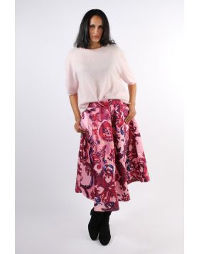 Blue patterned midi skirt in a soft, flowing A line silhouette. The circle skirt cut gently accentuates a feminine style. Features an elasticated waistband for maximum comfort. style MG13345.