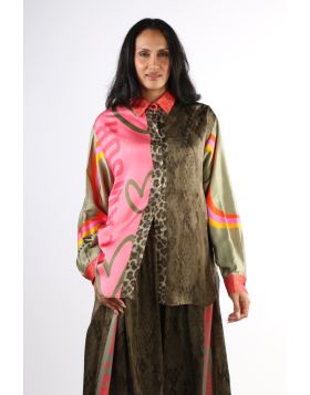 Embrace fearless self expression with this striking blouse that layers heart motifs, animal print, and vibrant colour blocking into one cohesive statement piece. Designed for the fashion forward individual who refuses to blend in, the relaxed silhouette b