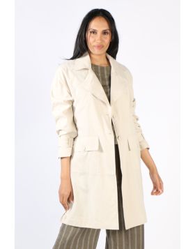 Layer up in style with this coat jacket by Ping Pong. In 100% Sanded Tencel, the edge to edge trench coat style jacket had full tab sleeves and double front ppckets. Style it over a dress or separates. Style P555402.