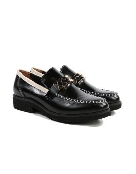 Round toe loafer made in leather with contrast top stitching. featuring a metal accent and contrast trim. Light, flexible and non slip rubber sole. style 242033.