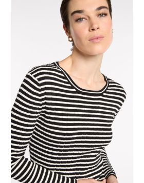 The Fine Stripe Rib Knit blends style and comfort with its round neckline and long sleeves. Elevated with varied fine ribs, adding texture and depth to the overall look while remaining comfortable with it's built in stretch. This essential piece is a must