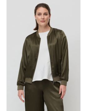 The After Hours Bomber is a relaxed fit jacket crafted from lustrous viscose with a subtle sheen for a modern edge. Designed in a classic bomber silhouette with a ribbed neckband and cuffs, functional front pockets and a zip through front, it is an effort
