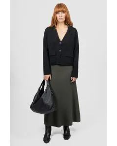 Introducing the new Flared Skirt with Wide Band, a timeless addition to your wardrobe that effortlessly blends classic silhouette and modern comfort. Crafted with meticulous attention to detail, this skirt features a flattering flared cut that drapes beau