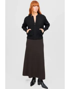 Introducing the new Flared Skirt with Wide Band, a timeless addition to your wardrobe that effortlessly blends classic silhouette and modern comfort. Crafted with meticulous attention to detail, this skirt features a flattering flared cut that drapes beau