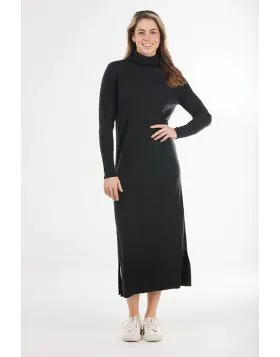 The Longline Roll Neck Dress offers a chic and modern take on winter dressing. Crafted from a luxurious blend of 95% Australian Merino Wool and 5% Mongolian Cashmere, this dress is super soft, warm, and perfect for layering during the cooler months. The f