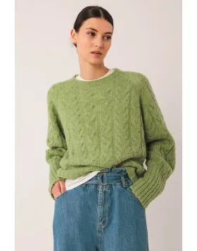 This braided knit sweater with alpaca will be one of your favorites from the collection. It is very trendy because it is cropped and loose. pair with high waisted baggy denims or skirts. EA501.
