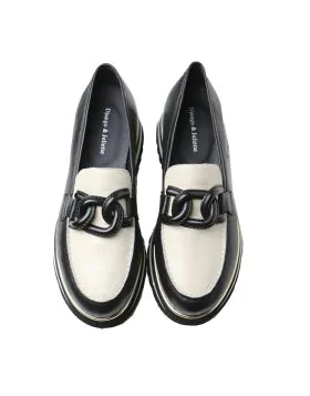 Go bold with these leather plaform loafers by Django and Juliette. EAILA transforms a traditional silhouette with a larger than life sole that elevates any outfit.
