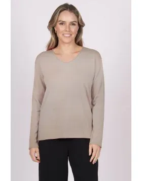 A classic cozy vibe by Fields ticks all the boxes for the season. In 100% easy care wool, the cardigan has a roll edge V neck and full sleeves. Style it with easy pants or skirts. FK5016.
