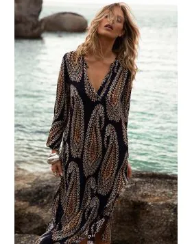 A refined essential for sun drenched escapes, the Provence Long Genie Dress by oneseason captures effortless glamour with a bohemian soul. Crafted from a featherlight viscose, it features the label s signature paisley motif in deep navy and golden ochre, 