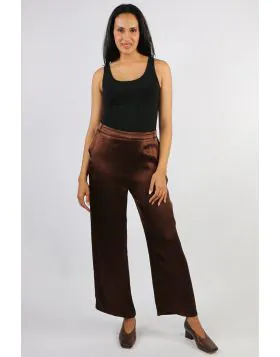 Sleek, fluid, and sophisticated, the Opera Wide Leg Pant brings effortless glamour to any occasion. Crafted from a soft satin fabric with a beautiful drape and subtle sheen, these pants offer a high rise fit and a relaxed wide leg silhouette that flatters