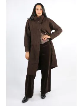 A statement knit coat designed for comfort and versatility. The Fusion Coat is made from a soft midweight wool blend and features a subtle ribbed texture that adds depth and warmth. The relaxed shape and longline length make it ideal for layering through 