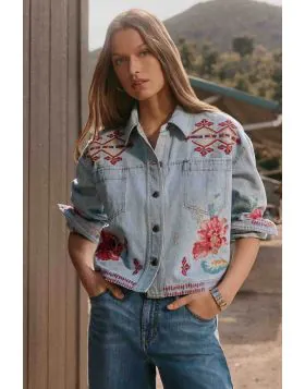 The Talulla Cropped Denim Jacket is crafted from 100% breathable cotton and is embellished with colorful floral embroidered detailing. Designed with a collared button front and distinctive yoke, this relaxed-fit cropped jacket is finished with a straight 