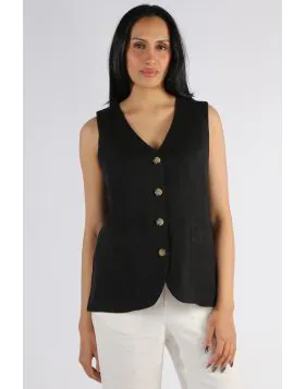 The Jump Button Vest offers timeless layering style with its clean lines and tailored fit. Crafted from a soft, lightweight fabric, this versatile womens vest features a button front closure, perfect for pairing over shirts, blouses, or dresses for a poli