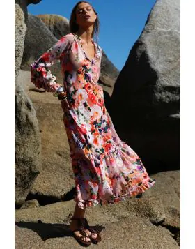 The Long Indi is our oneseason showstopper. The bias cut dreThe Long Indi is our oneseason showstopper. The bias cut dress, flowing fit, jumbo frills andThe Long Indi is our oneseason showstopper. The bias cut dress, flowing fit, jumbo frills and accentua