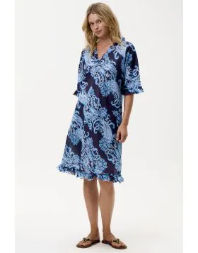 The Middy Indi is a shorter take on our much loved Long Indi. With its bias cut shape, flowing fit, and jumbo frills, it is effortless by day and a statement piece by night. 7709 6037.
