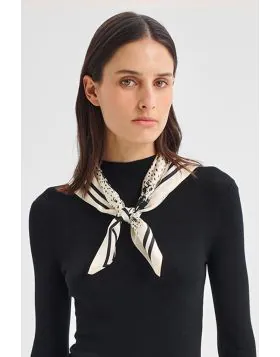 Elevate your look with this luxurious silk crepe satin scarf, crafted from 100% silk for a soft, fluid drape. Featuring an exclusive Morrison print, it adds a refined statement to any outfit.A2931.
