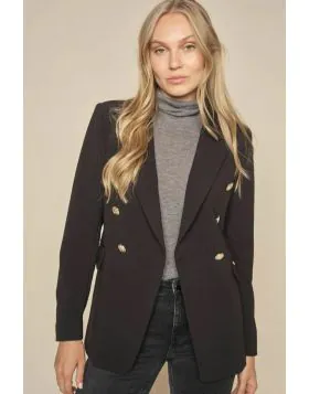 This blazer pays tribute to the timeless style of MOS MOSH. Crafted in a double breasted design, it boasts an elongated and oversized silhouette, adorned with exquisite gold embossed buttons. Style it with tailored pants for a polished look or go for a ca