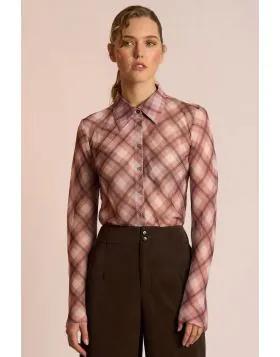 The Edgy Shirt by Neris is an elegant, elevated style crafted with a modern twist. Cut on the bias for a beautifully fluid drape, it features a classic collar and button up front. Raw edging at the hem and sleeves gives the shirt its signature attitude ba