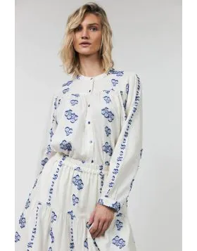 Nicky Shirt by Lollys Laundry. Nicky is a soft and feminine shirt with a relaxed silhouette and delicate handcrafted details. The lightweight quality is decorated with small embroidered motifs that create texture. The shirt reflects true craftsmanship and