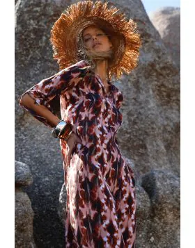 The Long Genie will be a sophisticated addition to your wardrobe. The style embraces a straight silhouette for timeless elegance. Crafted from breathable viscose, this maxi features a soft round neckline and fluted cuffs. 9693 734.
