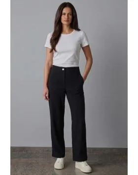 The Origin Pant is a timeless straight leg style crafted from a wool blend suiting. Featuring a fitted waistband with fly opening, it delivers a flattering silhouette and versatile elegance. Perfect for pairing with the Origin Jacket or knitwear.