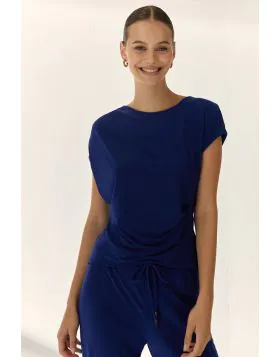 It is a plain knit boat neck top styled with relaxed, dropped short sleeves. It includes three distinct side pleats/ruching at the waist designed to create a flattering drape. Style it with your easy wide leg trousers or denims for a perfect every day ele