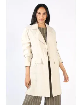 Layer up in style with this coat jacket by Ping Pong. In 100% Sanded Tencel, the edge to edge trench coat style jacket had full tab sleeves and double front ppckets. Style it over a dress or separates. Style P555402.