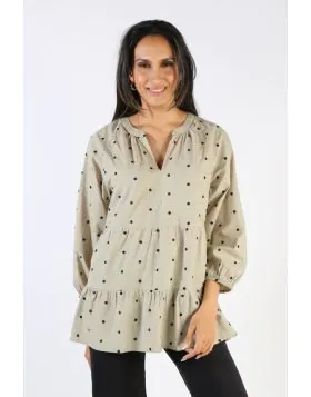 This lovely embroidered spot top effortlessly blends a boho chic shape with a classic navy and white spot. Made from a soft and breathable cotton voile, this blouse features a V-neckline, full length sleeves, a tiered bodice and embroidery detail. Perfect