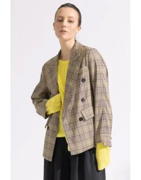 This refined look pairs a classic, structured check blazer with dark denim and a textured accessory for a polished yet approachable style. The Reese Blazer by Blacklist is a standout double-breasted piece featuring a timeless brown and tan check pattern. 