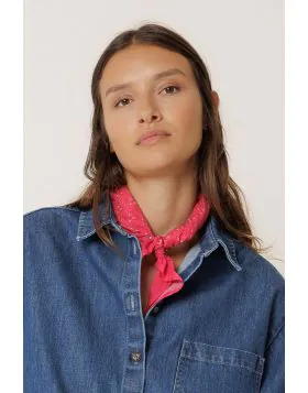 This scarf will elevate all your looks. It is made from organic cotton and features a block print with a floral border. RG657.
