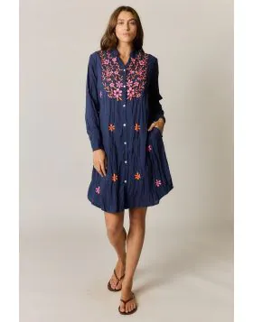 The Sasha Shirtmaker takes the shirt dress silhouette and adds embroidered front panel and soft pleating. Made from 100% cotton, it's designed in Australia for easy, escape ready dressing.
