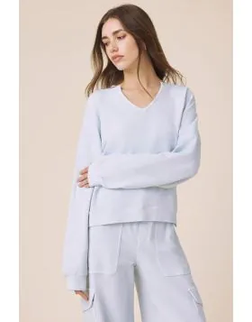 A modern take on a cozy essential, this Splendid Alessia Pullover features a relaxed silhouette with a clean split neckline and long sleeves for an elevated feel. Designed in a smooth, lightweight fabric with dropped shoulders, straight hem and subtle dra
