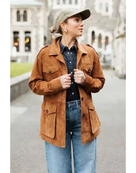 Combine utility with style this season in this Koyu jacket in suede. The Utility jacket is a perfect layering piece that features front patch pockets with full sleeves and front button closure. Finished with a belt to cinch in or leave it altogether, styl
