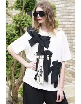 Playful yet polished, the PRESENT DREAMS T shirt from Trelise Cooper makes a subtle statement. Made from COTTON S UP cotton t shirting, it is finished with a fixed grosgrain bow embellishment that adds a touch of charm to its easy silhouette. Playful with