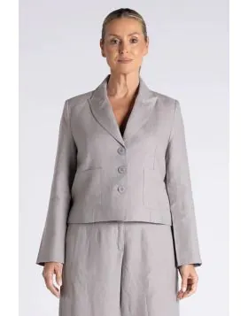 Effortless layering meets timeless style with this tweed linen cropped blazer. Crafted from a luxurious blend of natural fibres, it features a relaxed boxy fit that drapes beautifully over any outfit. The cropped silhouette hits at the perfect length for 