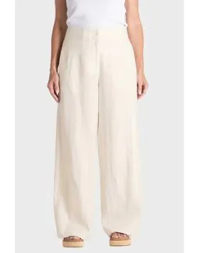 Elevate your wardrobe with the Two Ts Abbey Wide Leg Pant in beautiful tweed linen. The milk colorway brings understated sophistication to this season's essential silhouette. Cut with a generous wide leg for effortless movement and modern style, these tai