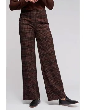 Full length wide leg pant in a soft stretch knit, designed in our Cherry print a black, red, and brown check pattern. The pull on style and elasticated waistband offer comfortable ease of wear, while the no pocket design keeps the fit smooth and streamlin