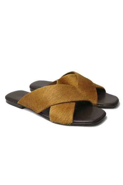 Meet your new go-to sandal, made with soft pony hair for a sophisticated take on the summer sandal. Easy sandal with pony hair upper with lightly padded leather insole. Style 2309.
