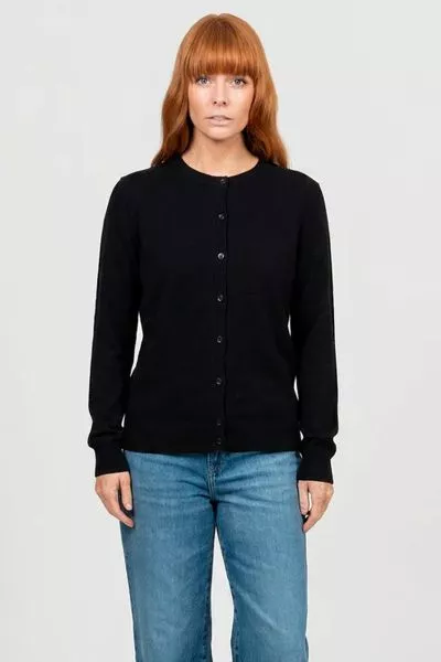 Our Kate Essential Button to Neck Cardi is the perfect all around cardigan. It has a hip grazing length, a Classic button through closure, and a stunning crew neckline. Fitted silhouette, true to size. Wear it over any outfit to add a touch of luxury and 