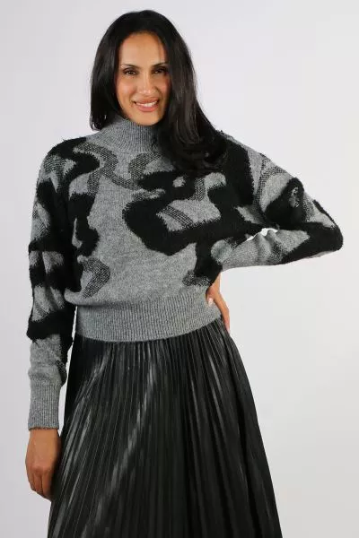 The Oris Top by Blacklist is a contemporary knit designed to make a statement while keeping you warm and comfortable. Crafted from a soft, cosy knit, it features a high roll neckline and a relaxed silhouette that offers both warmth and effortless style. T