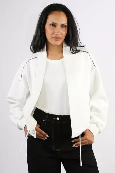 The Bone and Arrow Voi Jacket is a signature simple but stylish open front jacket from the New Zealand based label. It is designed with a relaxed feel and does not feature buttons or fastenings. Features contrast detail stitching on the shoulders and a dr