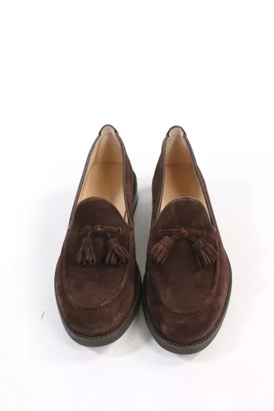 Round toe loafer made in suede. Matching suede tassel trim on the instep. Light, flexible and non slip rubber sole.