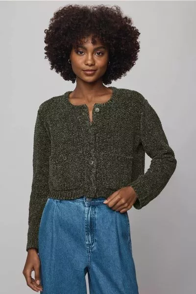 This plush chenille cardigan is the layer you will reach for on repeat. Cropped just right and spun from soft chenille yarn, its cozy without the bulk perfect for lounging or layering. Finished with a button front and two patch pockets complete with closu