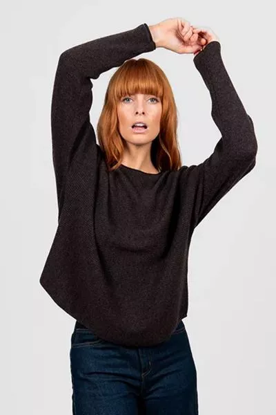 Experience effortless style and comfort with the Dolman Rib Pullover, a modern knitwear essential that elevates your casual wardrobe with understated sophistication. This pullover features a relaxed dolman sleeve silhouette, providing roomy comfort while 