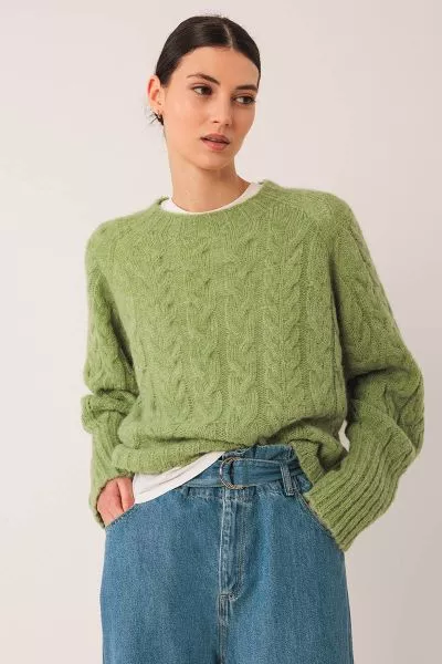 This braided knit sweater with alpaca will be one of your favorites from the collection. It is very trendy because it is cropped and loose. pair with high waisted baggy denims or skirts. EA501.
