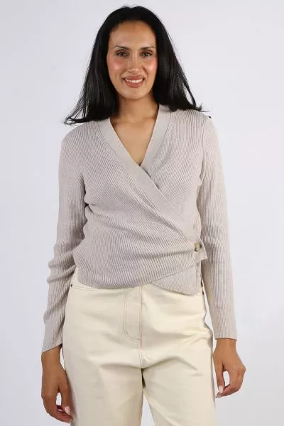 A perfect cardigan that gives you many styling options, this Wrap Cardi by Foil is a perfect one. In an easy cotton blend, the long sleeve cardi with a V neck can be styled front open or wrapped around with a button closure on the side. The Classic Ribbed