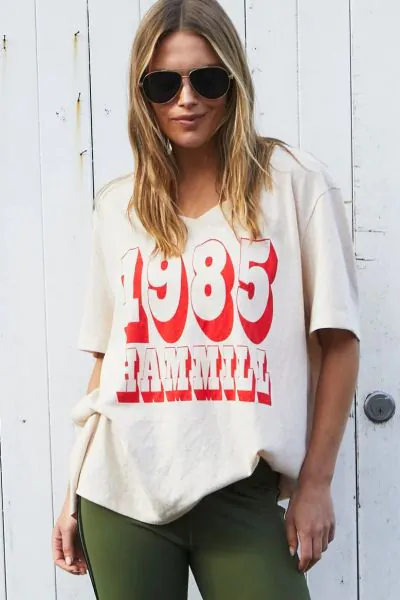 Oversized best selling V neck tee in white with washed black Hammill 74 logo print on the front. style H203.
